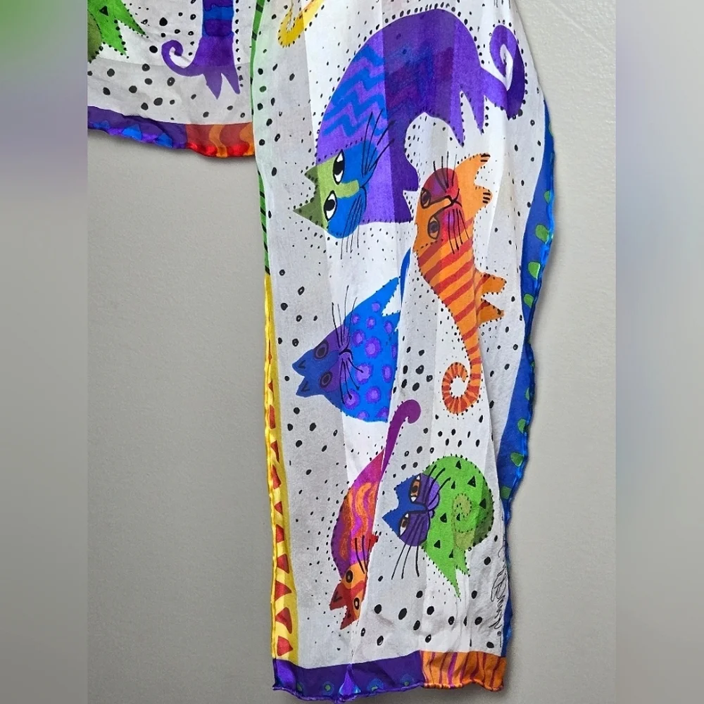 Laurel Burch measures 52